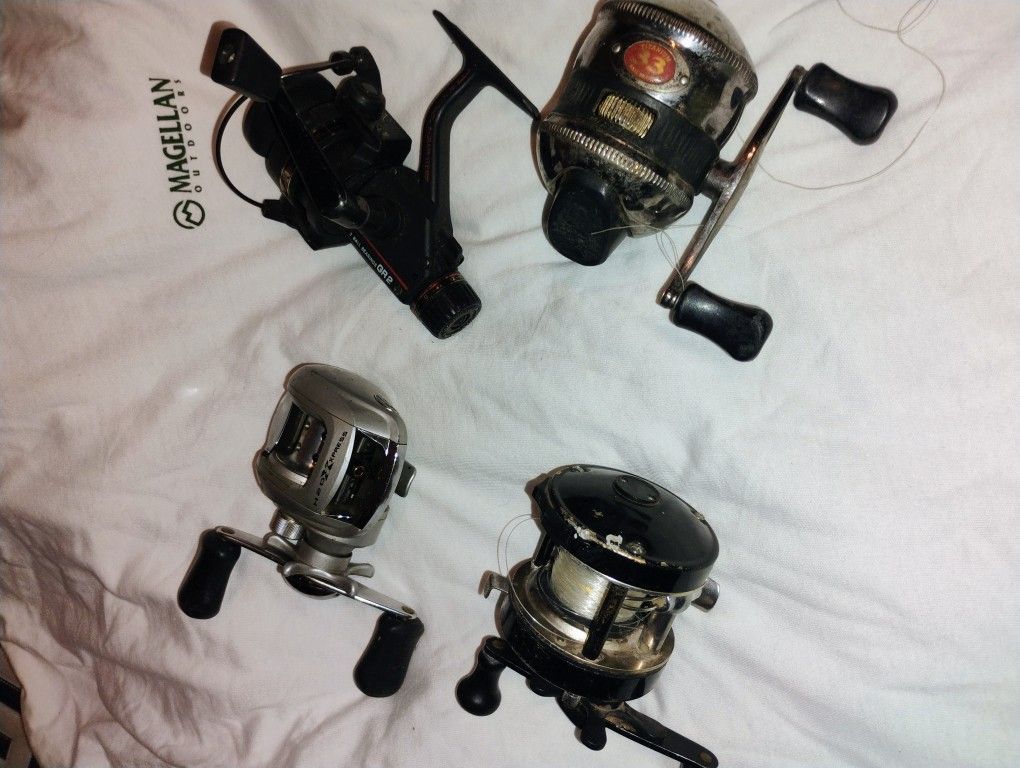 4 Fishing Reels ( nothing wrong W them)