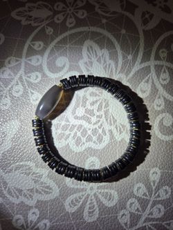 A Ming-Ching Dynasty Agate Bead with Coconut Husk Breacelat