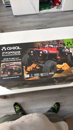 Axial RC Truck 1/10 SCX10 III Jeep CJ-7 4X4 RTR Brushed Rock Crawler, Red