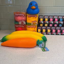 Squeeezy Squeezy Nee Doh NeeDoh nice cream cone nice berg fuzz ball glow in dark funky pup cool cats Mello Mallo glitter cube nice cube squeeezy