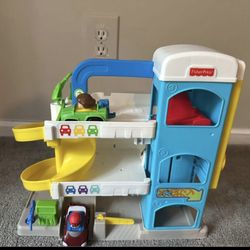 . Fisher-Price Little People - Helpful Neighbor Garage  Playset with Spiral Ramp and 2 Cars