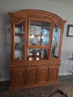 Solid oak dining table with matching hutch