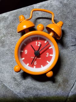 Mini clock color orange works battery included