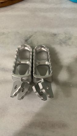 Surron lbx pegs