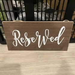 “Reserved” Signs