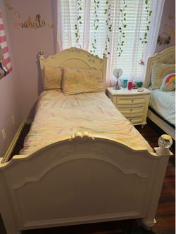 Twin white panel beds