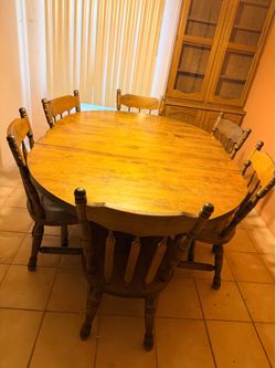 Wooden table with 6 chairs