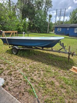Boat motor and trailer