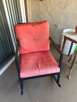 Metal garden rocker with cushions