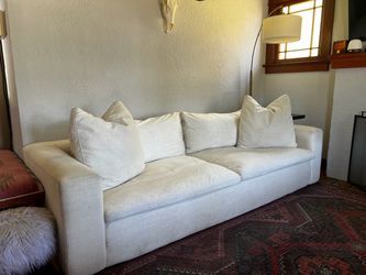 Large White Fabric Sofa with Throw Pillows
