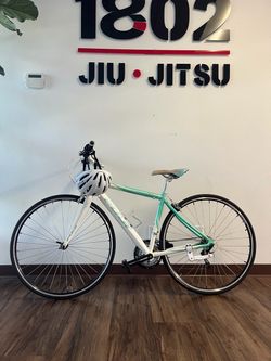 Fuji women’s road bike + helmet & lock