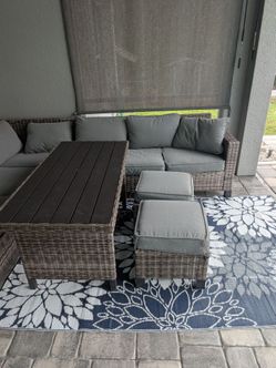 Patio L shaped sofa table and ottomans