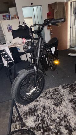 Ridstar Q20 fat tire electric moped-style bike in black.