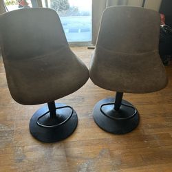 Leather Bar Stools Move Up And Down. 