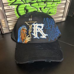 Rude Awakenings Hat Crucifixion  