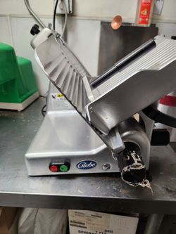 Globe Meat cutter good condition