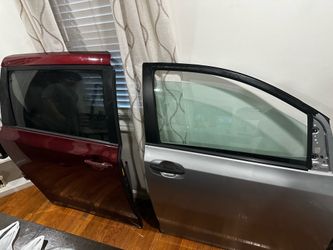2013 Sienna Passenger Side Front and side Door Assembly Color: silver and red