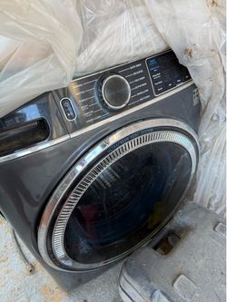 This is a GE Smart Front-Load Washing Machine featuring the UltraFresh Vent System with OdorBlock.