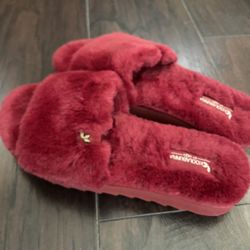 Size 9.  Ugg Slippers