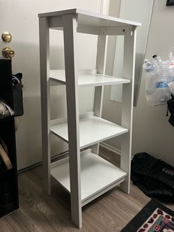 White slanted book shelf