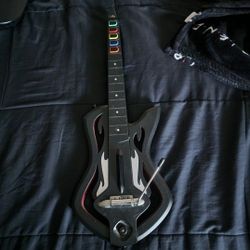 Black guitar hero controller