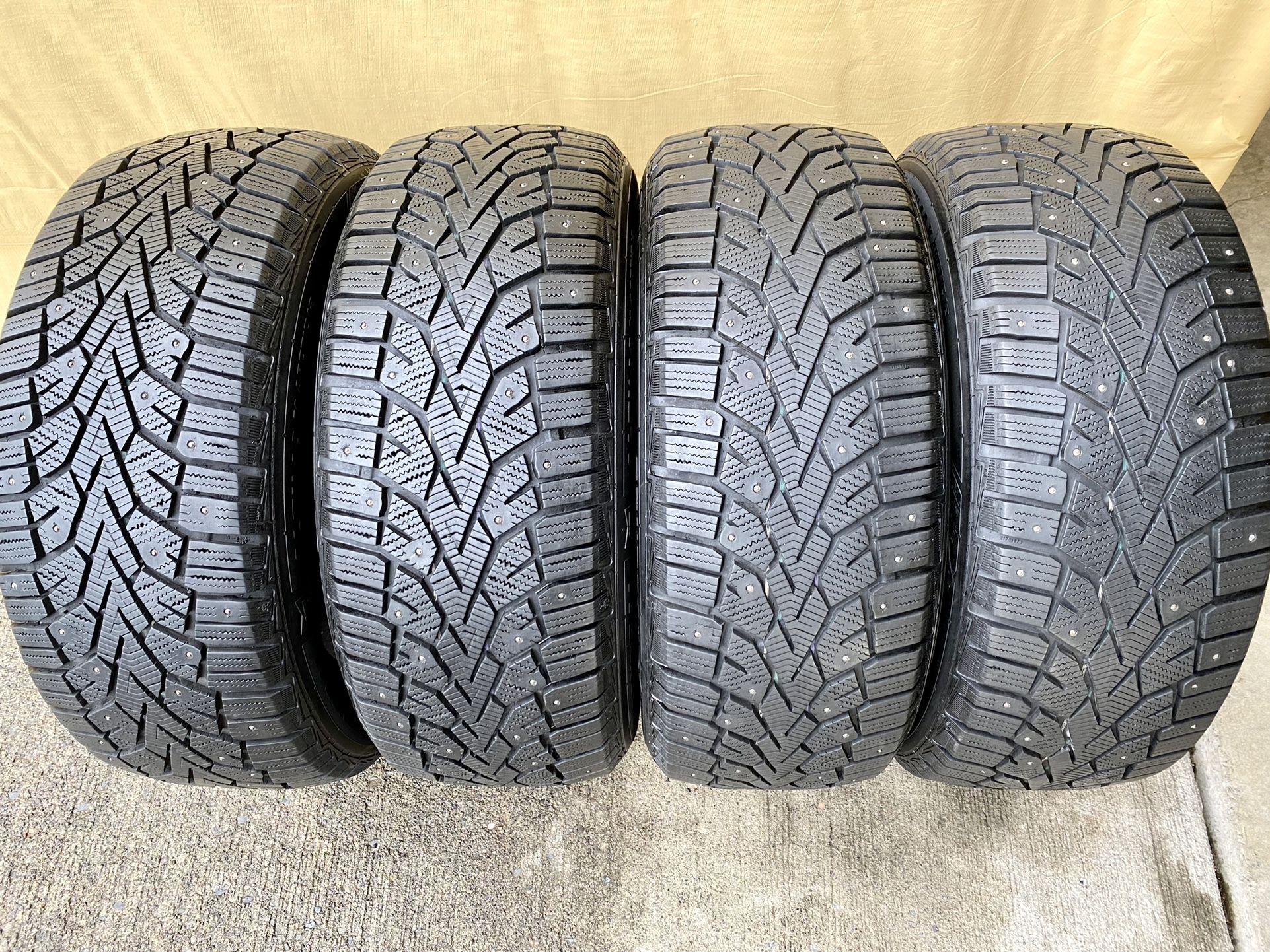 General Altimax 215 55 r16 Studded Snow Tires - Set of 4