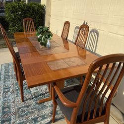 Refinished Danish Teak MCM Gangso table and 6 Reupholstered Benny Linden Design Teak Chairs.