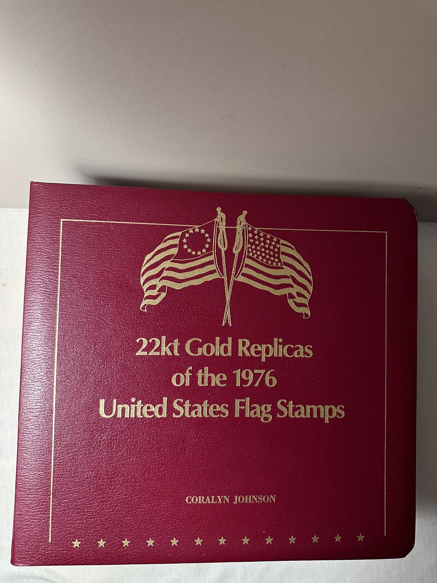 22kt gold replicas of the 1976 united states flag stamps