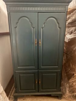 Quality Built Teal Colored Jasper Cabinet With Four Cabinet Doors