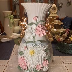 VERY UNIQUE AND Different LOOKING  VASE  16INCHES TALL  THIS IS BEAUTIFUL 