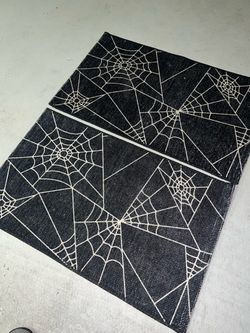 Two Spiderweb Floor Mats