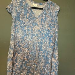 a J. Jill Love Linen shift dress in a blue and peach paisley print. It is made from 100%