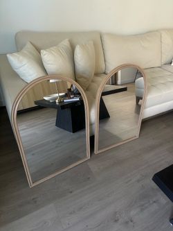 Two beautiful wood mirrors