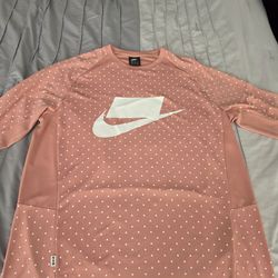 Nike Sportswear (NSW) long-sleeve knit top featuring a polka dot patternNike Sportswear (NSW) long-sleeve knit shirt