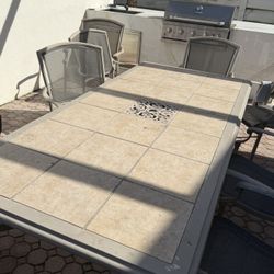 Patio table And Chairs Quick Sale 