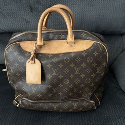 Louis Vuitton Alizé 24 Heures Travel Bag. Monogram Canvas. Authentic. Excellent Condition.