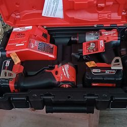Milwaukee M18 Fuel impact driver Drill (2)5.0ah batteries charger and hard case