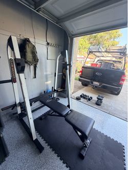 Workout bench and squat rack with dumbbell rack