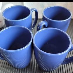 4 blue Corelle coffee mugs. good condition stoneware

