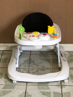 PRACTICALLY NEW BABY JOY WALKER MUSIC LIGHTS AND SONGS WORKS!!!!