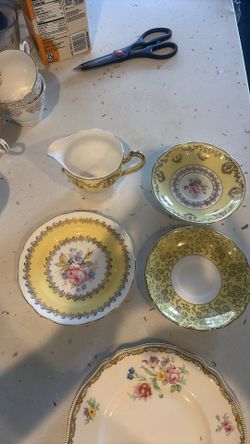 Yellow tea plates and saucer