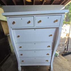 Vintage dresser sanded & fresh paint
Orange glass pulls 
refurbished from panorama city