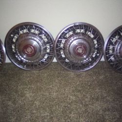 Cadillac Vintage Hubcaps Set( Plus Grill And Other Parts 
