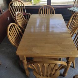 Wooden Dining Table, Chairs, And Rocker 