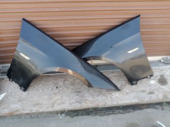 2007-2013 bmw 328i Coupe (2 doors) fenders with light oem.