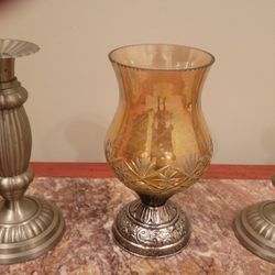 Two Candle Holders and One Glass Candle holder
