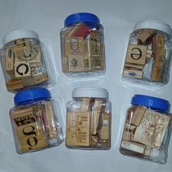 12 OF These Containers Full Of Stamps 