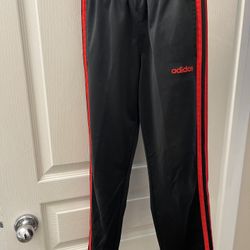 Boys Adidas Pants, black with red stripes. Size 8.