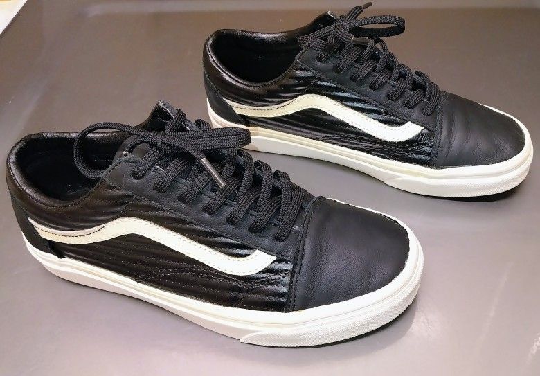 Classic Vans Old Skool in black leather with white stripe. Men’s 6 / Women’s 7.5. Rare.