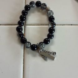 Pull on black bracelet